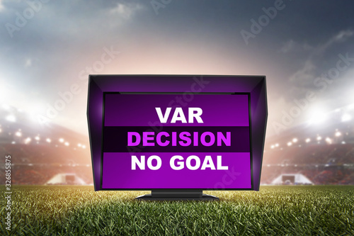 technology var decision no goal.The video assistant referee scene a match official in football stadium. 