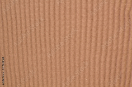 Fabric cotton fold, top view. Beige textile