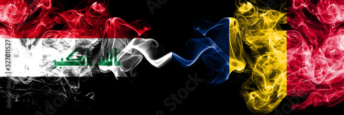 Iraq, Iraqi vs Chad, Chadian smoky mystic flags placed side by side. Thick colored silky smokes flags together.