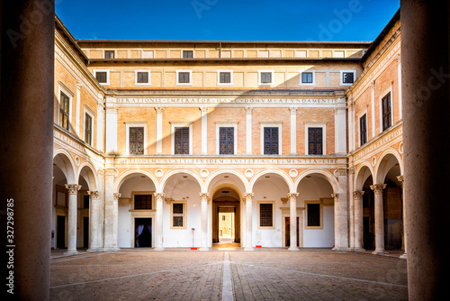 URBINO - ITALY – Courtyard of Palazzo Ducale (Ducal Palace), now a museum, in Urbino. Marche region, Italy.