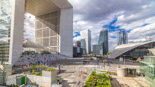 The Grande Arche and skyscrapers timelapse in the Defence business district of Paris, France.