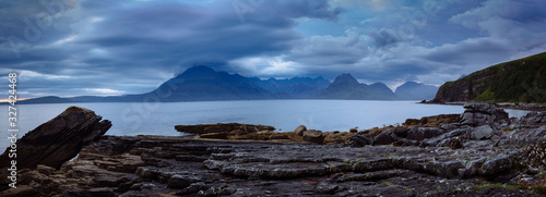 View on Cuillin Hills during late sunset/night from a small village Elgol, located in Isle of Skye, Scotland, UK