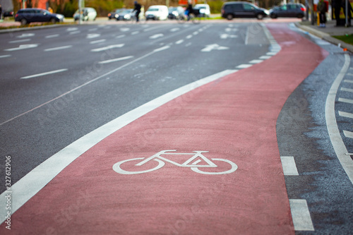 Bicycle sign on a red bike path in Europe