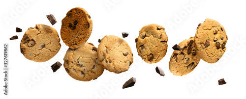 Flying Chocolate chip cookies with pieces of chocolate isolated on white background. High resolution image.