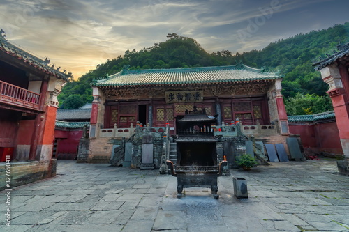 Sunrise in Sacred Taizi Po Temple (Fuzheng Guan). A taoist building complex built by Ming Dynasty in Wudang Mountains, Wudang, Hubei province, China
