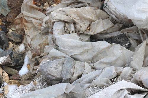 Construction waste with plastic wasteelements at municipal landfill