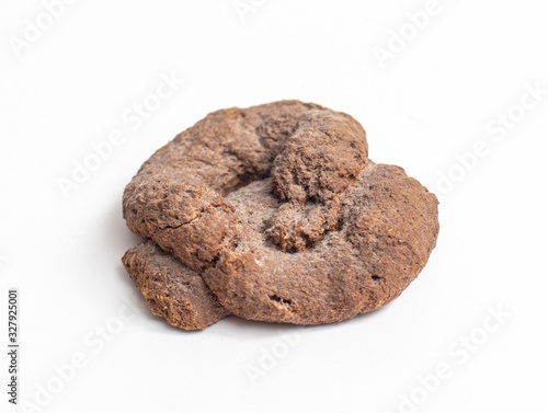 An artificial toy piece of shit isolated on white