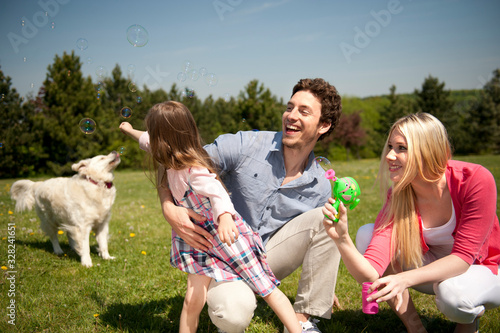 Happy family on a meadow