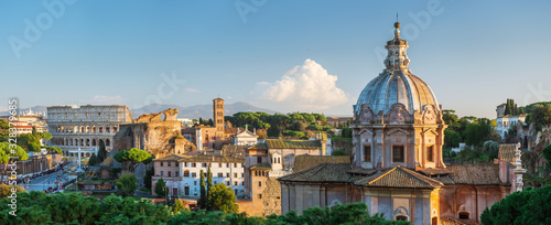 wide panorama to roman forum and colosseum in Rome