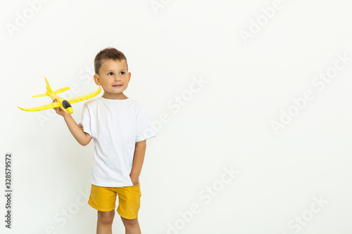 Cute little boy playing with a toy