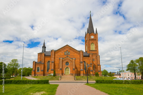 View of the old Lutheran church of the city of Loviisa on a cloudy June day. Finland