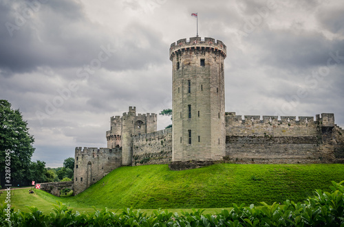 Warwick Castle with main tower peaking to the sky, England