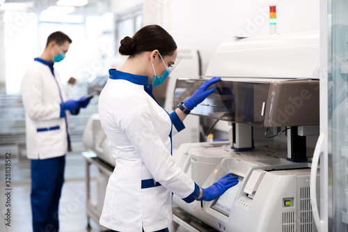 Female researcher doing molecular allergy diagnostics in laboratory