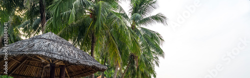 Place to relax. Leisure at sea. Umbrella Caribbean Summer background.