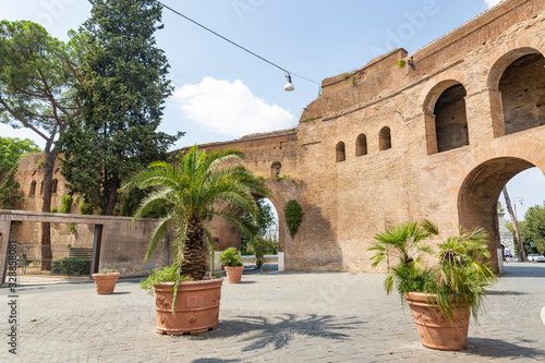 Porta Pinciana arched gate in ancient city walls (Largo Federico Fellini) in Rome, Lazio, Italy