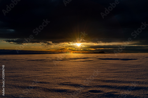 A Beautiful Sunrise over the Snowy Plains