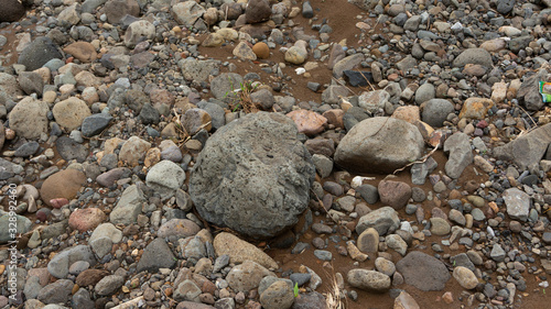 Rocks in the river after the flood. Images suitable for use as wallpaper or graphic material