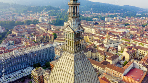 Turin, Italy. Flight over the city. Mole Antonelliana - a 19th-century building with a 121 m high dome and a spire, Aerial View