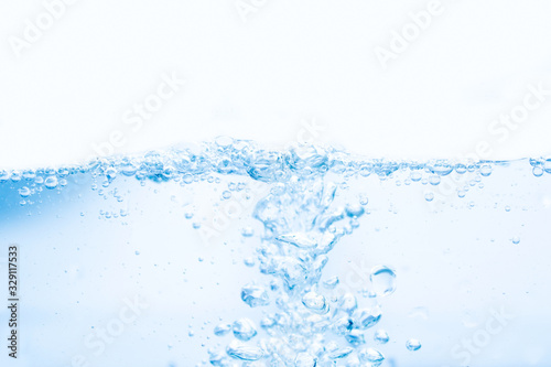 Water with bubbles inside and waves.