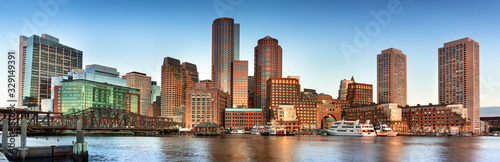 Downtown panoramic city view of Boston Massachusetts looking over the riverfront harbor from Fan Pier Park