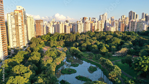 Aerial view of the largest park ofGoiania, Goias, Brazil with tropical forest and many residential buildings arround it