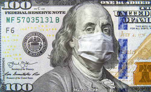 COVID-19 coronavirus, economy and financial crisis, money bill with mask. Coronavirus affects global stock market.