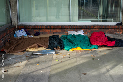 Sleeping bags on the ground laid down by rough sleepers or homeless people