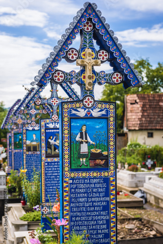 Characterstic painted graves on a famous Merry Cemetery in Sapanta village, Romania