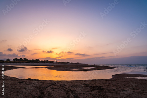 Sunset on the beach in Mediterranean Sea, Oliva, Valencia