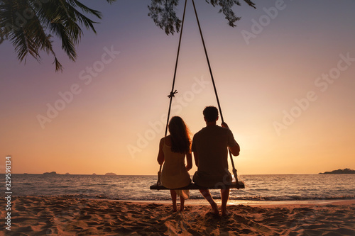 honeymoon travel, silhouette of romantic couple on sunset beach, tropical holidays near the sea, man and woman together on vacation