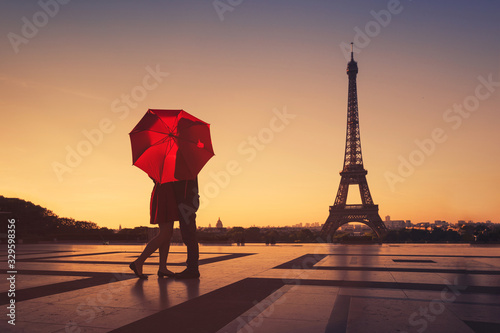 couple travel to Paris, silhouette of lovers kissing near Eiffel tower, romantic escape destination for valentines day