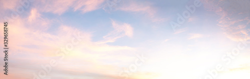 light soft panorama sunset sky background with pink clouds