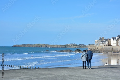 a couple of retired people who is watching the sea at Saint-Malo in brittany. France