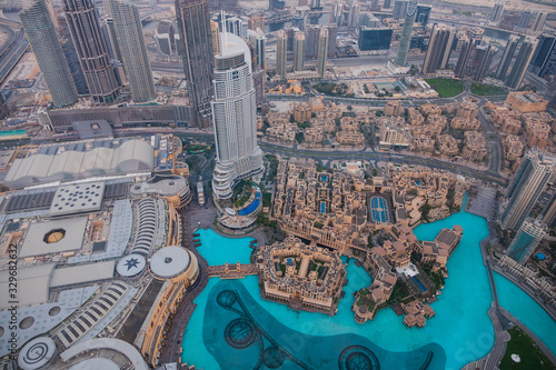 DUBAI, UAE - may 2019: Aerial view of Downtown Dubai with man made lake and skyscrapers from the tallest building in the world, Burj Khalifa, at 828m