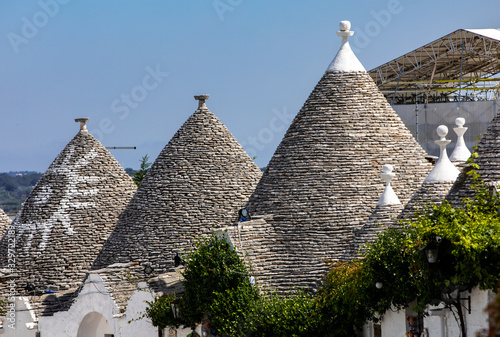 Stone roof of Trulli House in Alberobello, Italy. The style of construction is specific to the Murge area of the Italian region of Apulia (in Italian Puglia). Made of limestone and keystone.