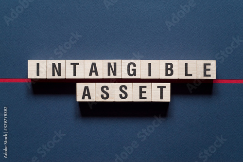 Intangible asset word concept on cubes