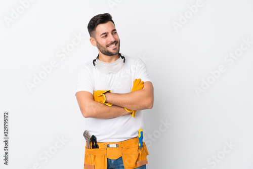 Craftsmen or electrician man over isolated white background laughing