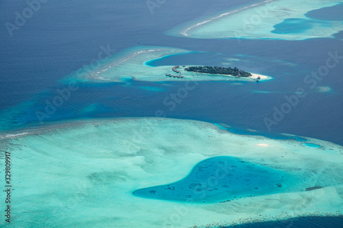 Aerial view of Maldives atolls is the world top beauty. Maldives tourism, luxury travel destination landscape, seascape
