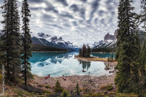 Spirit Island with Canadian rockies on Maligne Lake in autumn forest at Jasper national park