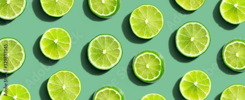 Fresh green limes overhead view - flat lay