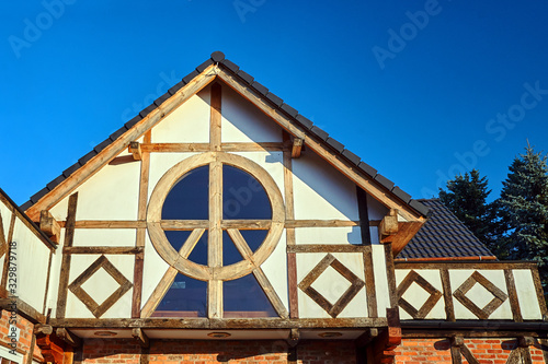 Half-timbered superstructure of a country house in Poland.