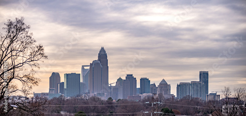 sunset and overcast over charlotte nc cityscape