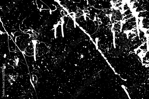 White abstract spray spray on a black background. Creative texture.