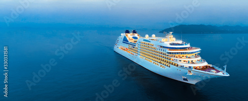 Aerial view of beautiful white cruise ship above luxury cruise in the ocean sea at early in the morning time concept smart tourism travel on holiday vacation time on summer, webinar banner forwarder 