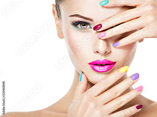 beautiful woman with colored nails