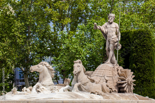 The Neptune fountain a neoclassical style fountain located in the Plaza de Canovas del Castillo built in 1786 in the city of Madrid