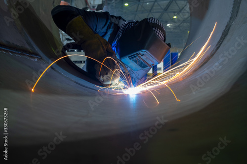 Welding of stainless steel pipes. Semi-automatic arc welding. MIG welding.