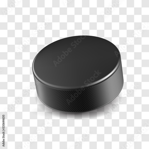 Realistic black rubber hockey puck isolated on transparent background. Ice hockey competition and design element for tournament banner. Sports equipment for team game on stadium vector illustration.