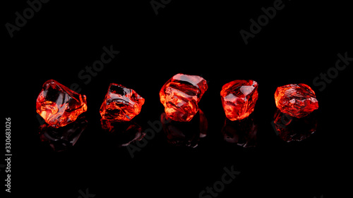 Closeup of red gems stone garnet isolated