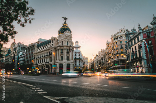 Madrid, cityscape at Calle de Alcala and Gran Via at sunset with traffic lights. The center of the city. Spain